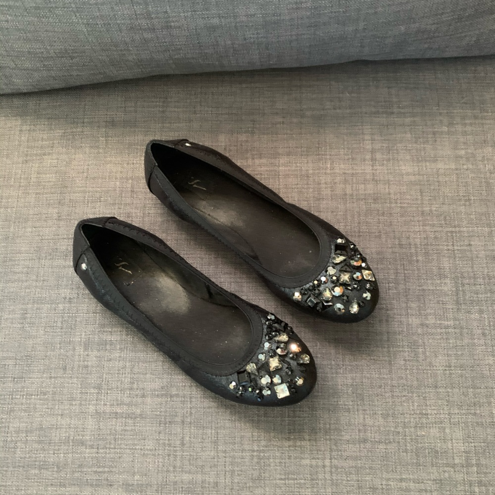 Vera Wang slip on flats.